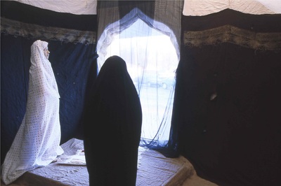 viewer with woman praying
